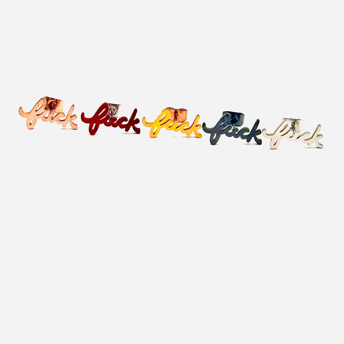 Cursive Fuck stud earrings displayed in multiple metallic and color finishes