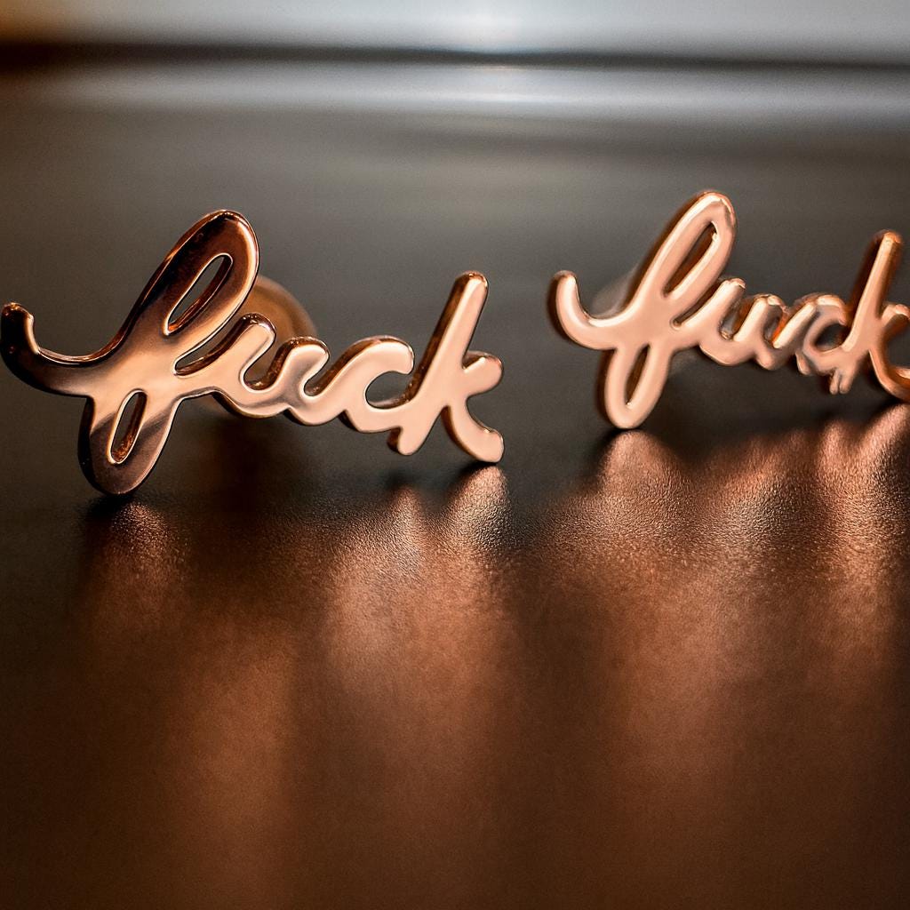 Black finish cursive Fuck stud earrings for edgy minimalist everyday wear