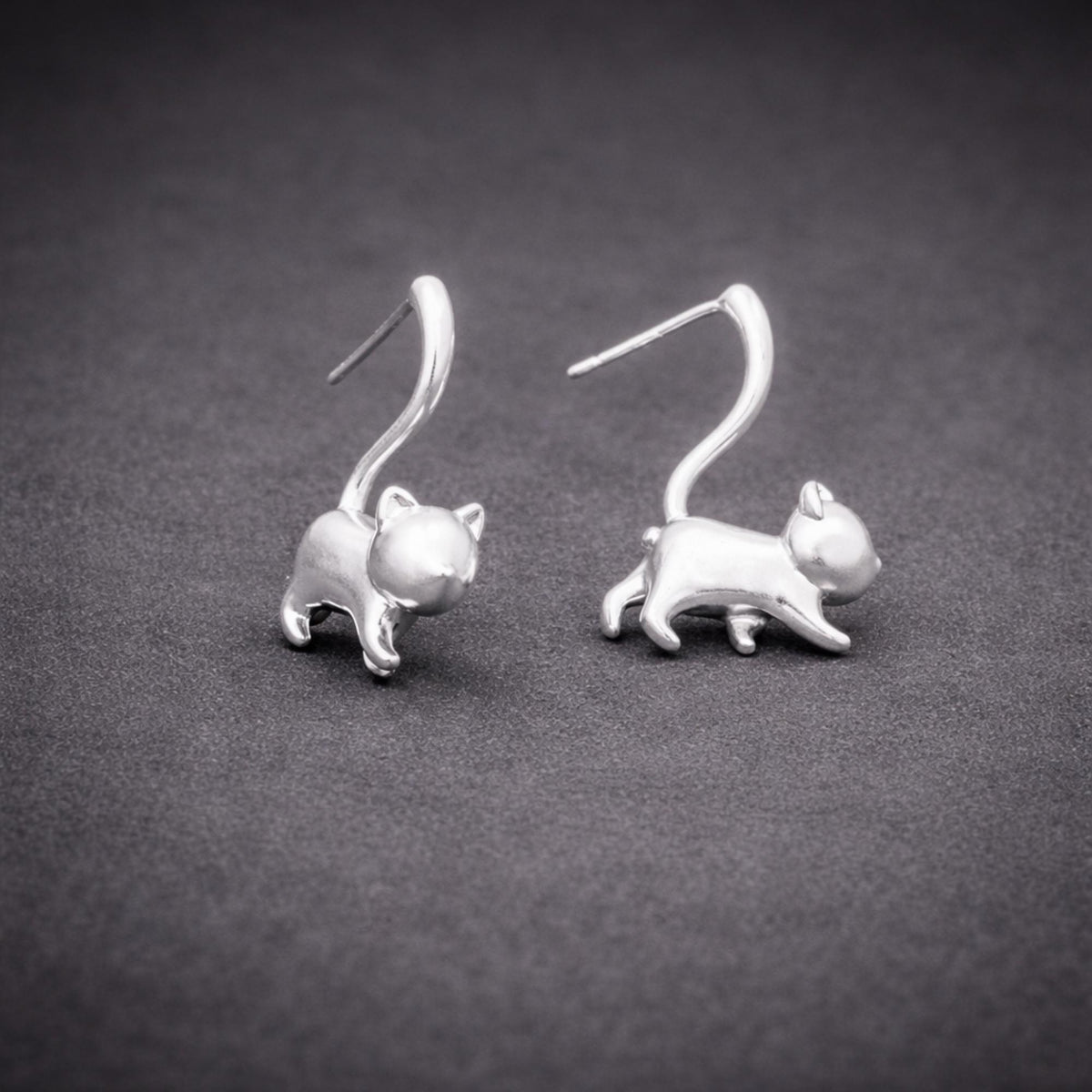 Silver Cat Stud Earrings: Wrap Tail Design in Gunmetal or Silver Finish