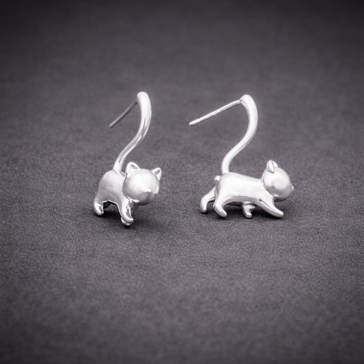 Silver Cat Stud Earrings: Wrap Tail Design in Gunmetal or Silver Finish