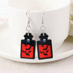 Gothic Skull Dangle Earrings: Vampire Goth Jewelry