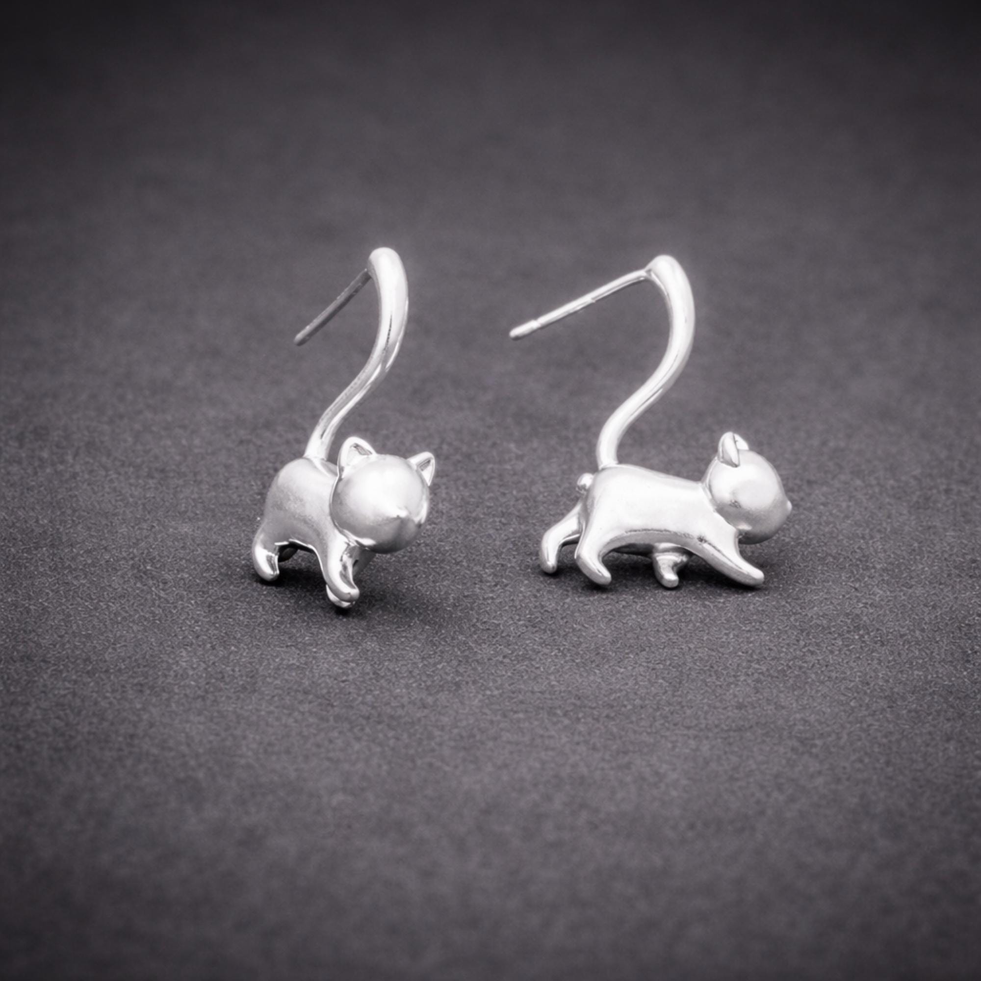 Silver Cat Stud Earrings: Wrap Tail Design in Gunmetal or Silver Finish